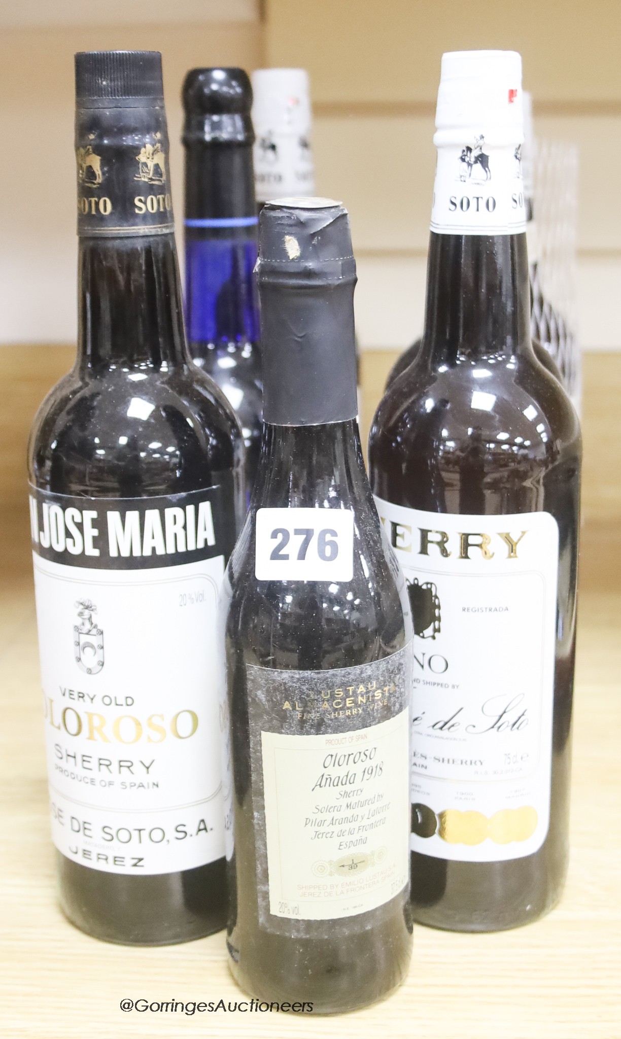 Six assorted sherries including Don Jose Maria Very Old Oloroso, Amontillado, Manzanilla etc. and one half bottle.